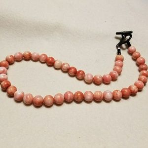 Artisan coral necklace.